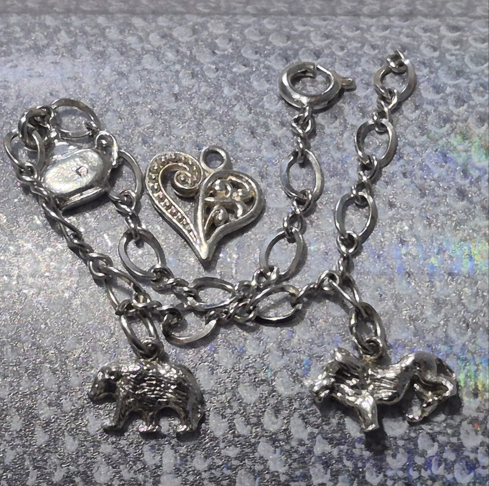 Silver Animal Charm Bracelet With Extra Heart Charm